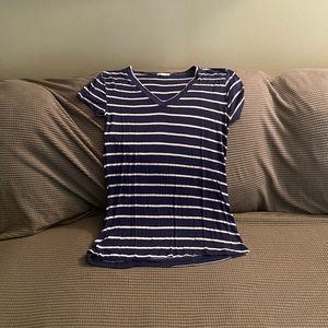 This is a navy blue and white stripped shirt.